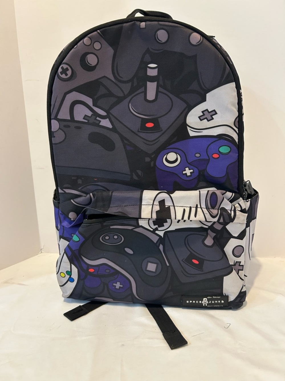 Gaming Controllers Print Backpack in Black & Purple